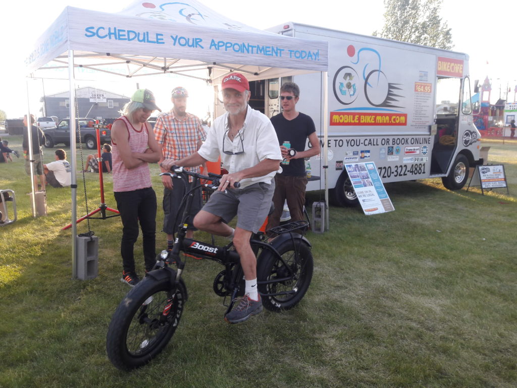 Mobilebikeman.com van and tent at Ride the Rockies 2017